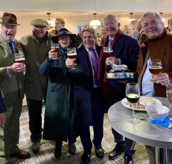 Wincanton Badger Chase 2019 Winning ower Sir Alex Ferguson celebrates with a beer